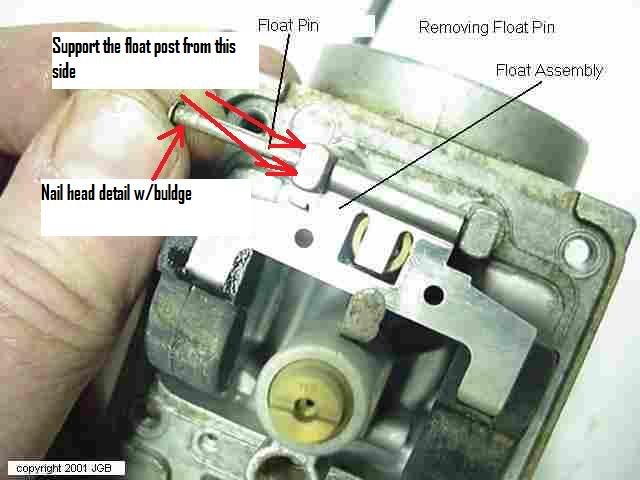 Removing float pin